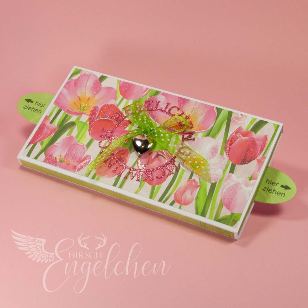 Gutschein mit einem grünen Daumen