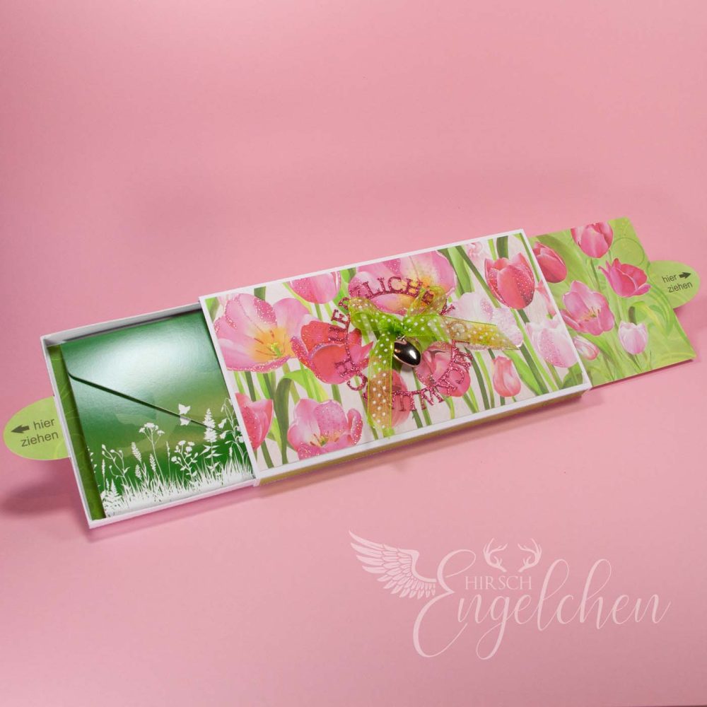 Gutschein mit einem grünen Daumen